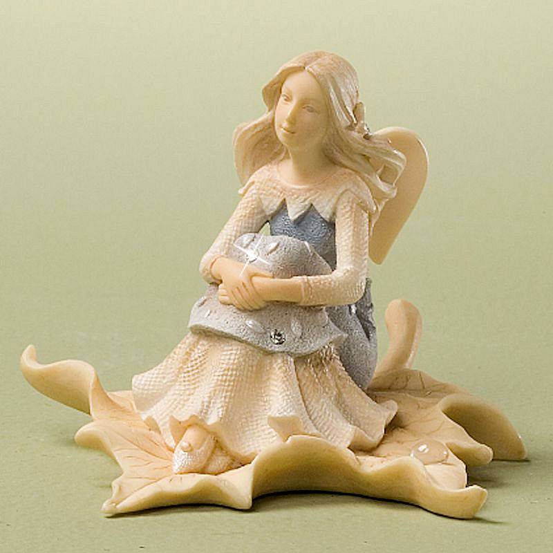 Sitting on a Leaf Angel Figurine by Foundations